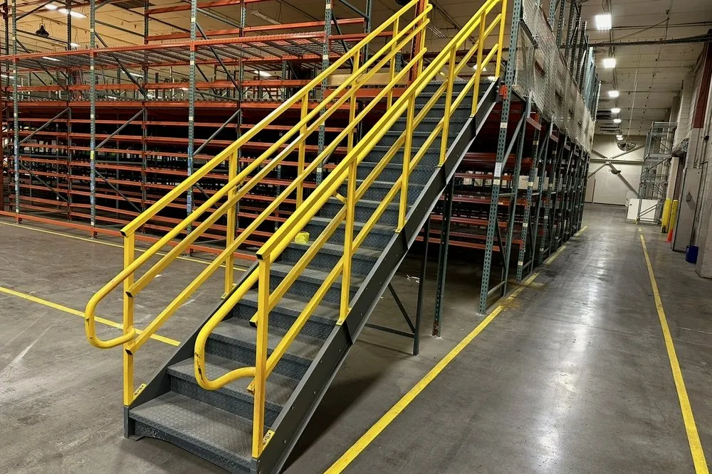 Steel mezzanine and stair tower in a warehouse